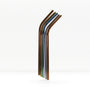 Rainbow metal drinking straws in a glass jar