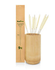 Nine cotton straw cleaning brushes with twisted metal handles beside a tall brown box and bamboo holder.
